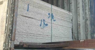 松原 芝麻白花岗岩石材3.0公分光面毛板装柜出货