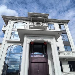 松原白麻别墅外墙干挂石材效果示例