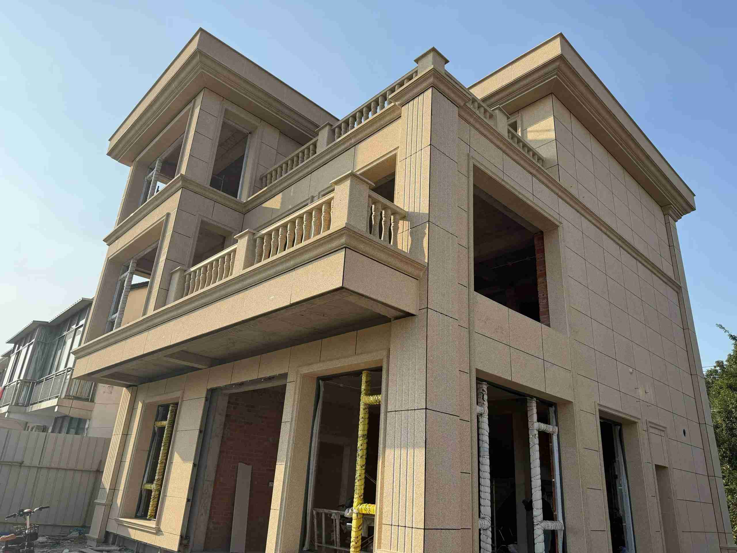 松原 黄金麻花岗岩石材荔枝面外墙干挂效果展示